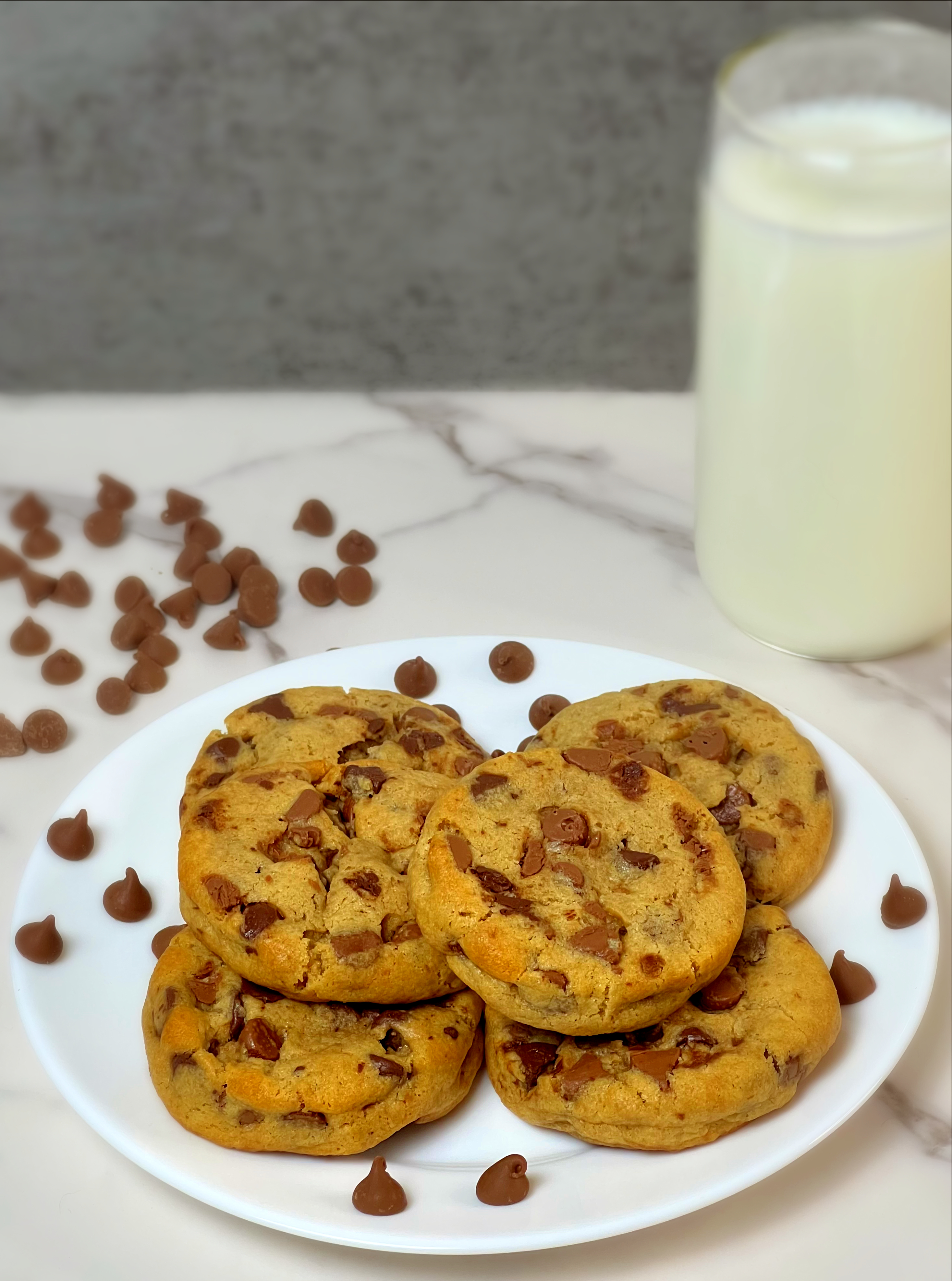 Chocolate chip cookies with a glass of milk